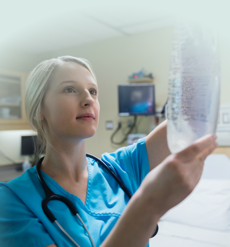 Nurse holding a closed infusion systems bag